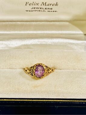 Solid 14k yellow gold amethyst ring in original box.